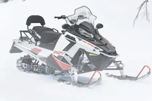 a group of people skiing on the snow