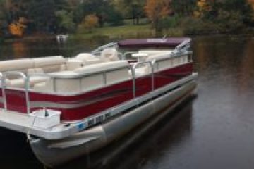 a small boat in a body of water