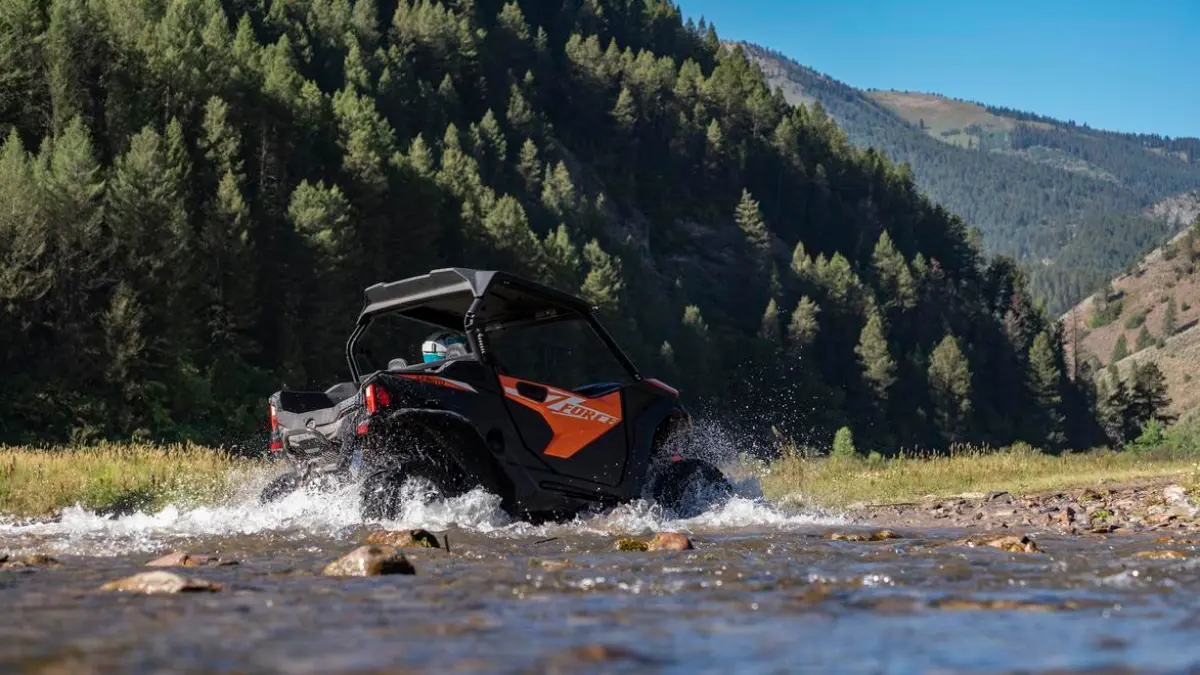 a man riding on top of a mountain