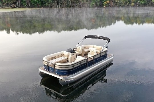 a small boat in a body of water